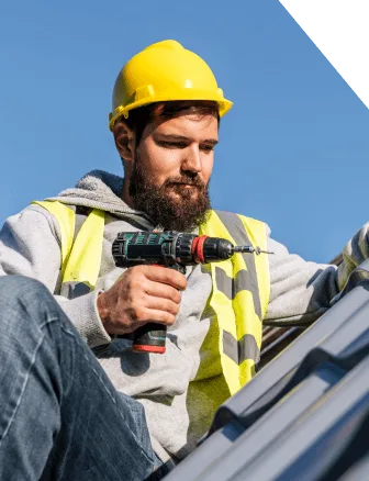 Roofer repairing leaking roof in Frederick Maryland