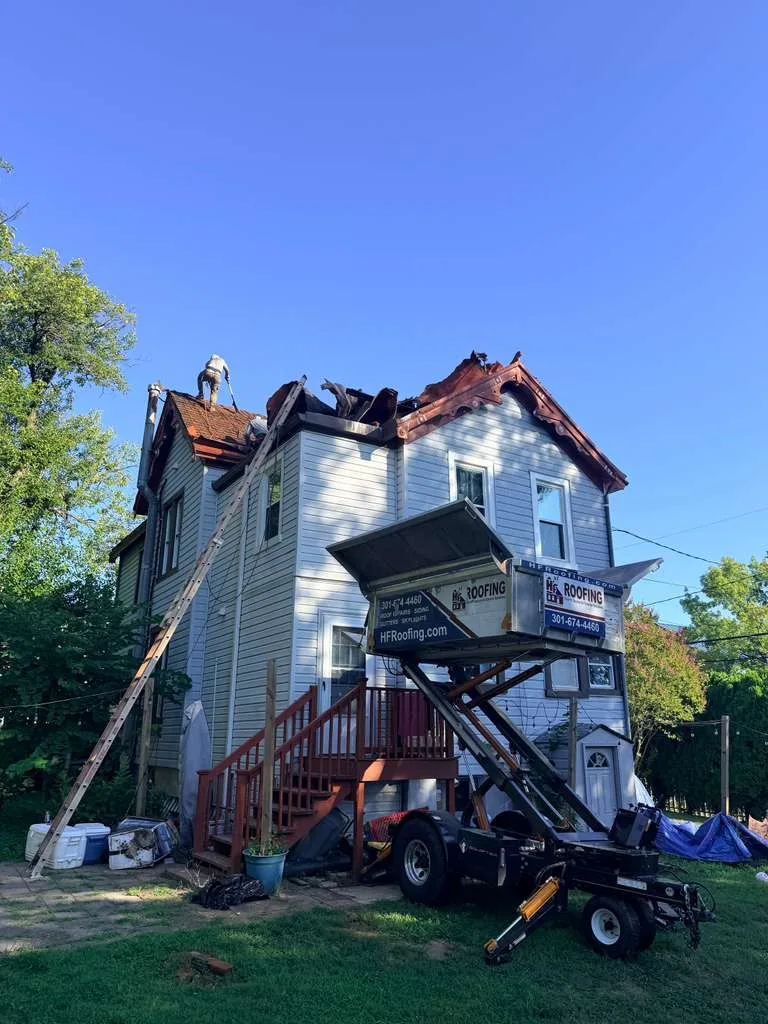 Aging roof on a historic home in Laurel, MD before replacement