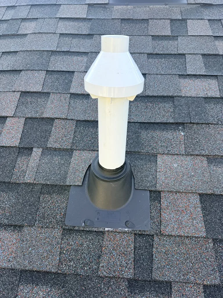 New pipe flashing sealing an HVAC roof penetration in College Park, MD